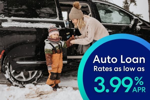 Happy mom and daugher by minivan.